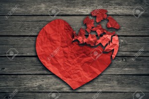 40353077-broken-heart-breakup-concept-separation-and-divorce-icon-red-crumpled-paper-shaped-as-a-torn-love-on-stock-photo